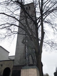 Statue for book smugglers and the bell Tower in Kaunas